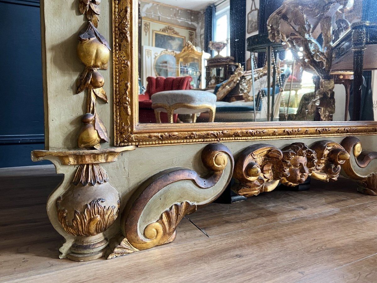 Italian mirror from the Napoleon III period in painted and gilded wood