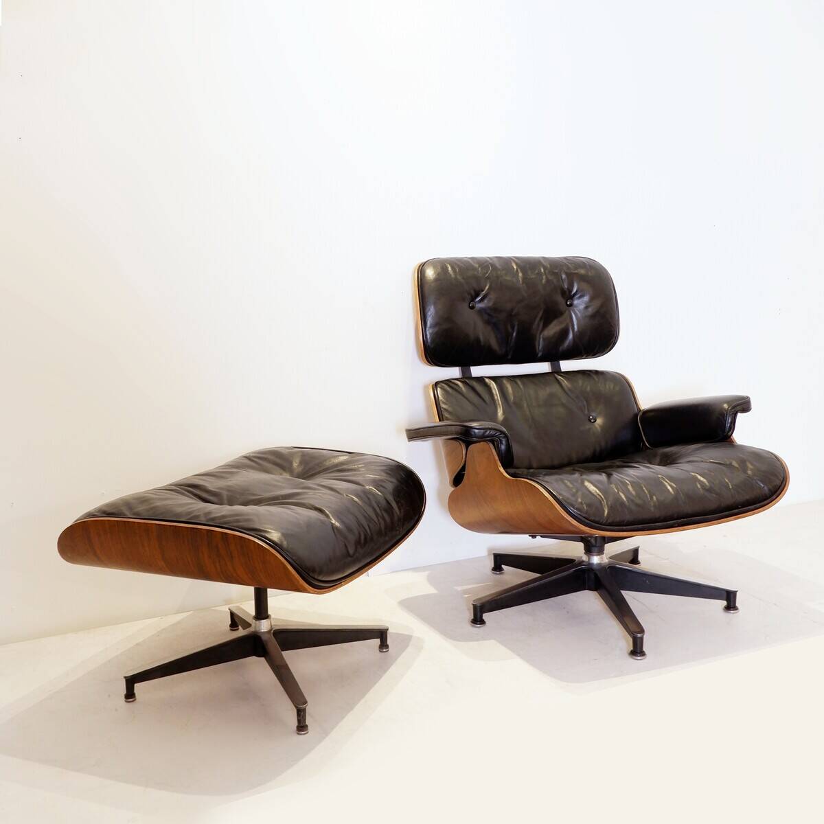 Mid-Century armchair and footrest by Charles & Ray Eames for Herman Miller