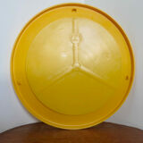 Round wall mounted mirror in yellow plastic 1970