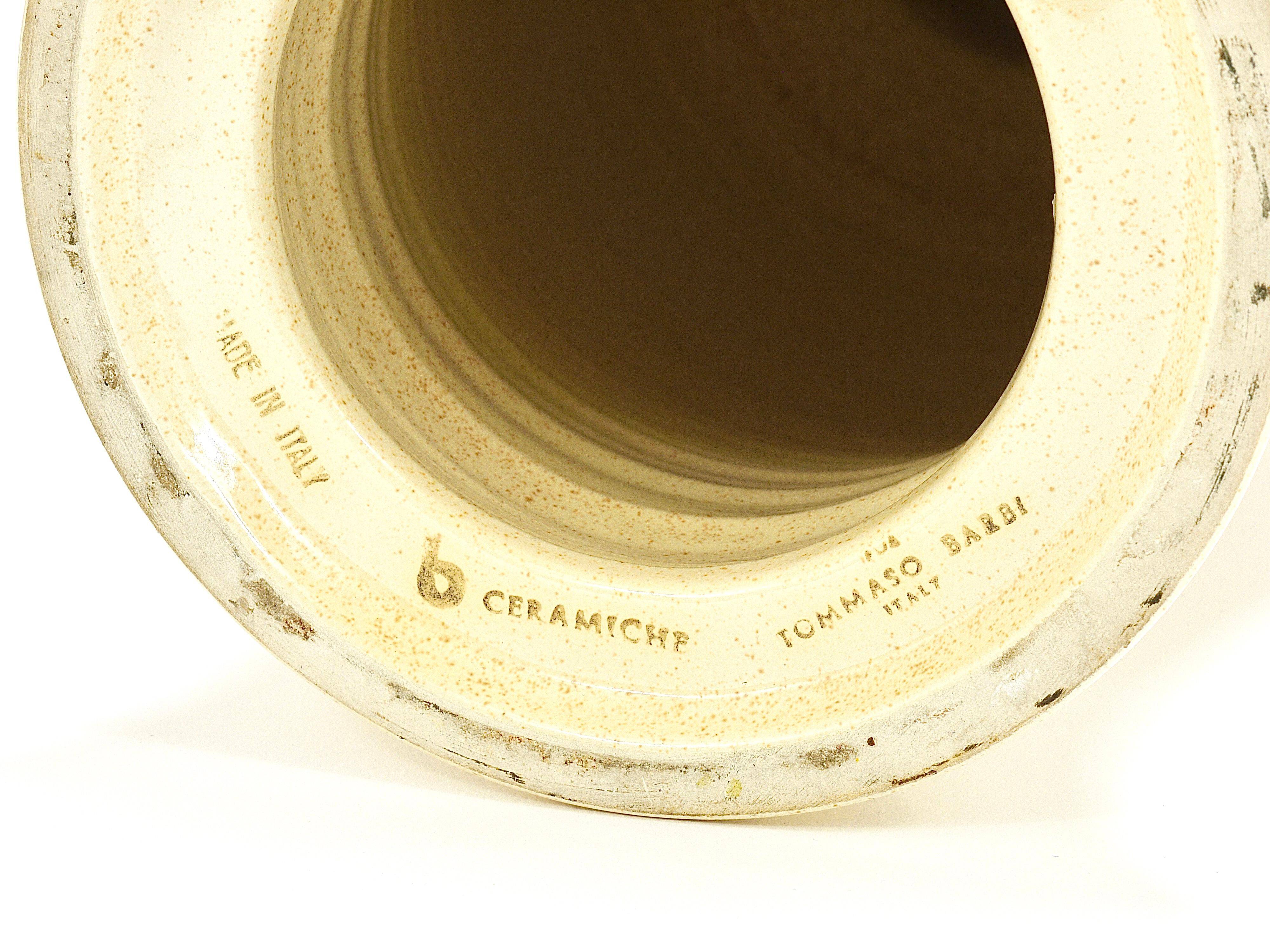 Pair of Tommaso Barbi Riviera palm tree table lamps from the 1970s with matching cushions.