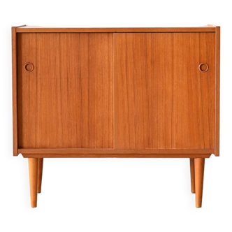 Vintage teak cabinet with sliding doors