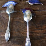 A set of 4 handcrafted pottery knife rests in blue.