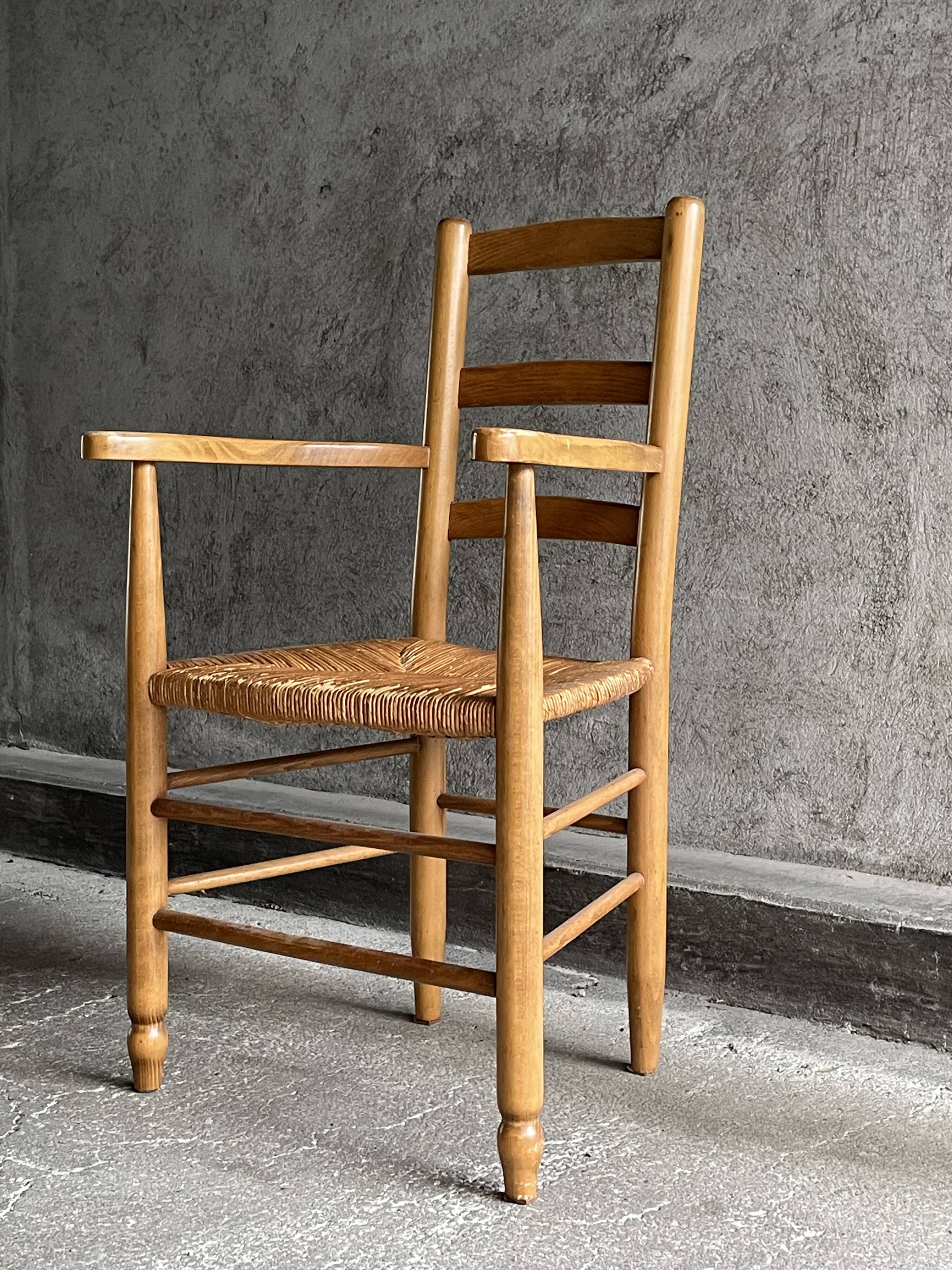 Straw chair with armrests, France