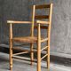 Straw chair with armrests, France