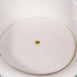 Space-age shell chair with storage, Ikea Popptorp chair.