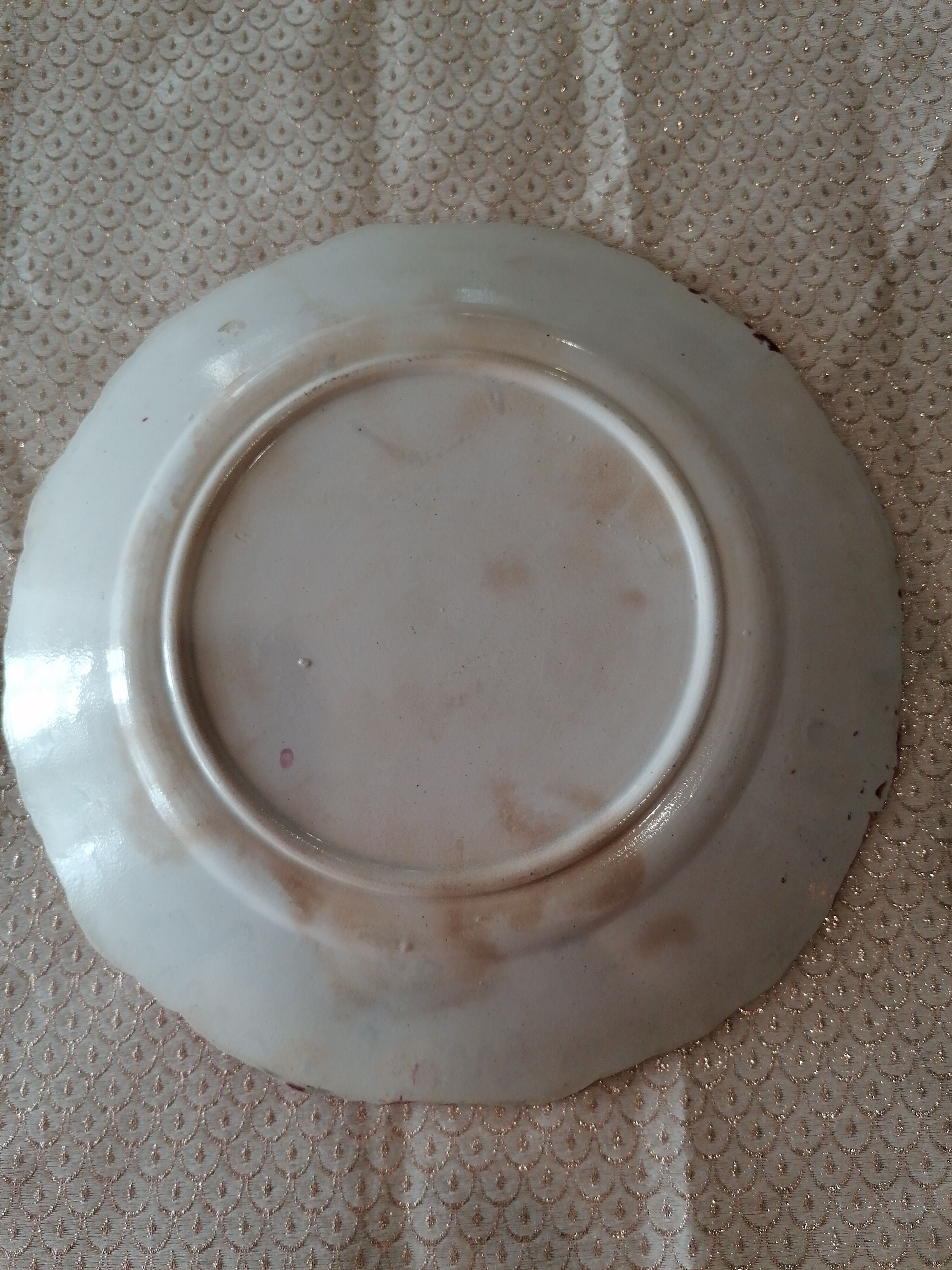 Old earthenware plate