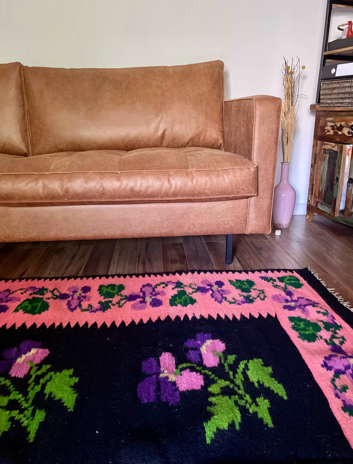Oltenian floral rug handwoven in wool, purple flowers on black and pink background