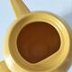 Salins teapot – Memphis design from the 1980s, golden yellow colour.