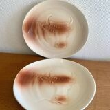 Saint Amand plates with cow head decoration.