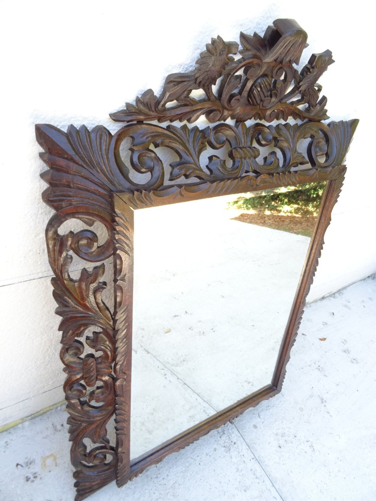 Miroir sculpté fronton lions