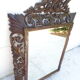 Miroir sculpté fronton lions