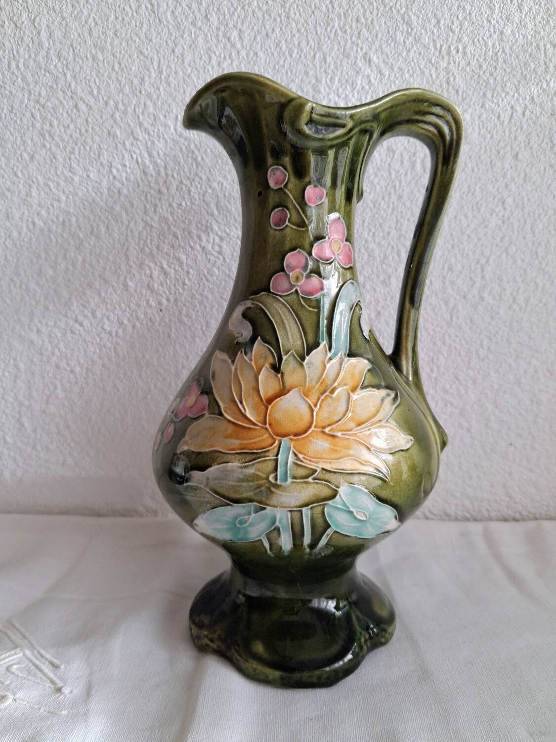 Art Nouveau pitcher in slipware