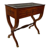 Mahogany jardinière inlaid with amaranth, with an "X" base and claw feet in bronze from the Charles X period.