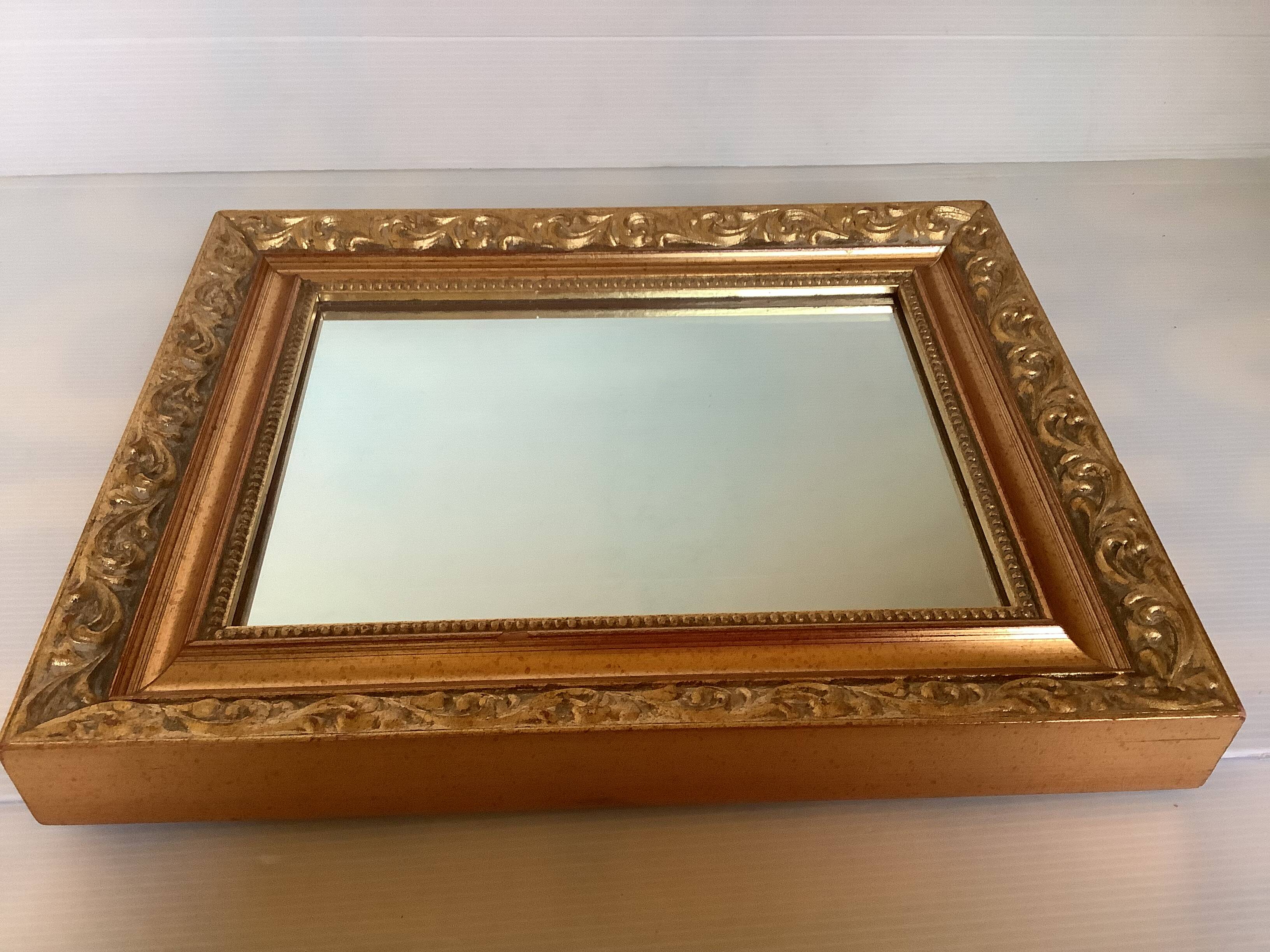 Gilded wooden beaded mirror