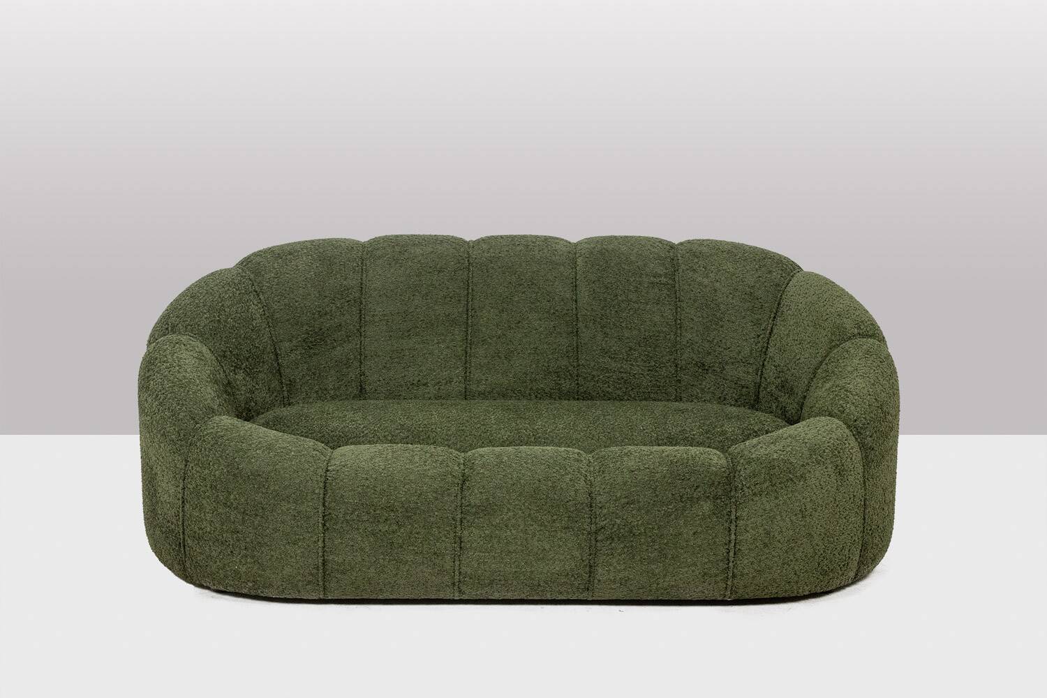 Sofa in bouclette fabric. Contemporary work.