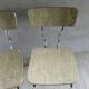 Pair of chairs in "wood" formica and gold edges, 1960s