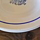 Vintage deep plates in ADP earthenware, blue rose patterns.