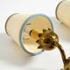 Two beautiful original Mid Century Modern floral wall lamps made of brass w