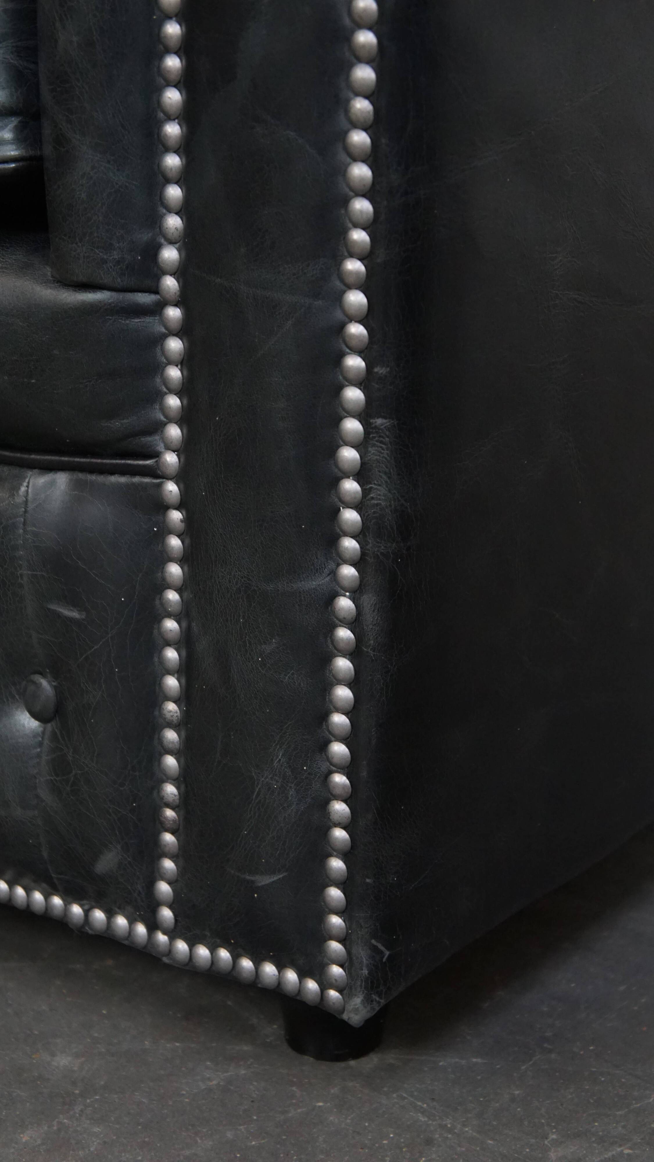 Set of 2 black Chesterfield armchairs in grained cowhide leather