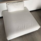 White leather pouf matching Ligne Roset sofa