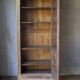 Glass-fronted cabinet from 1915, solid wood.