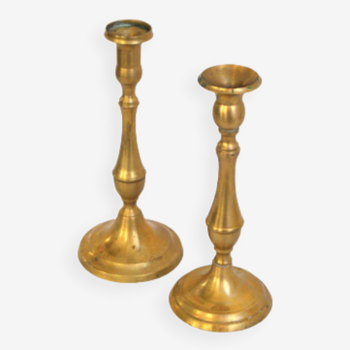 Pair of asymmetrical candlesticks