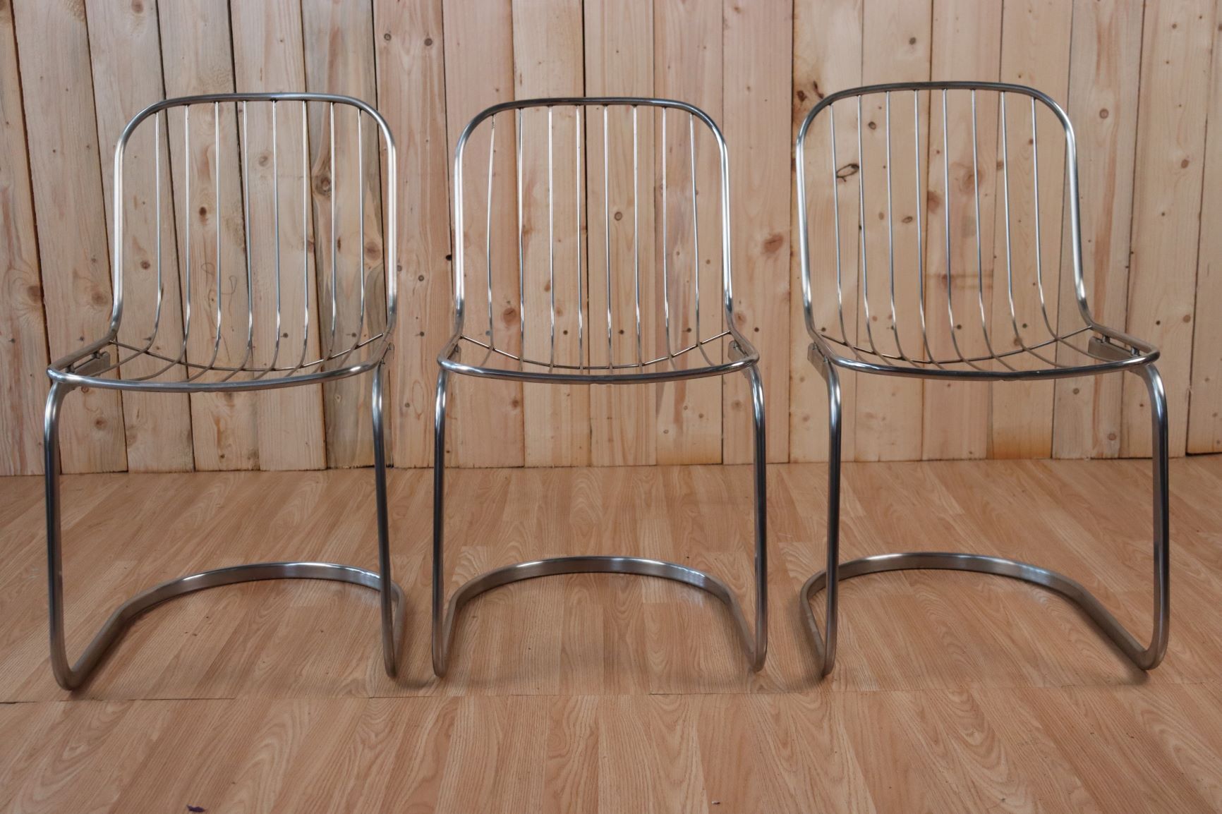 Series of 6 tubular steel chairs