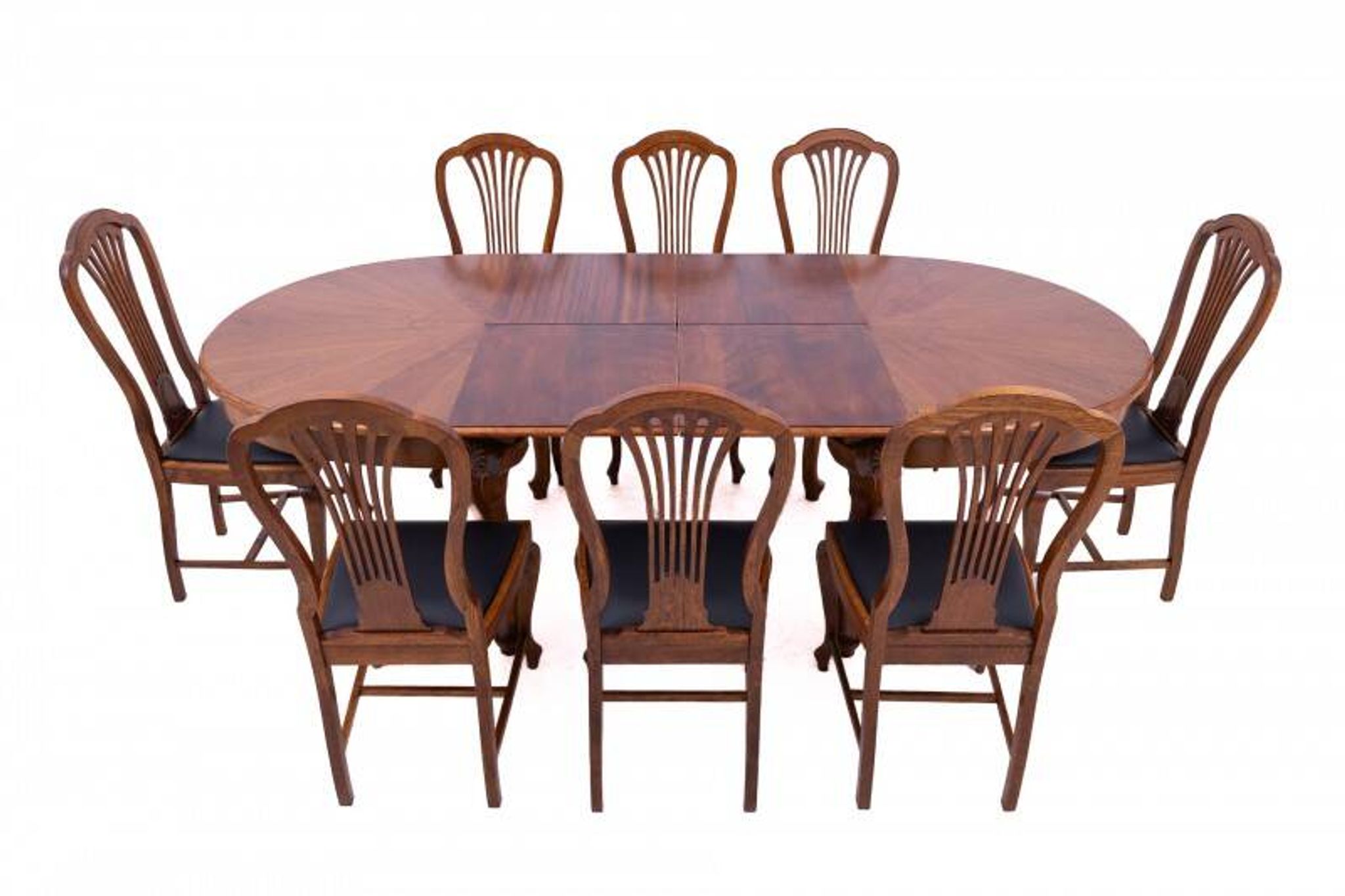 Large extendable table with eight chairs, late 19th century, France. After renovation.