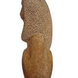 Sculpture of a lion in stone by Islay Grimes.