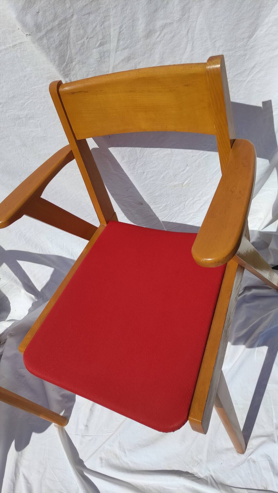 Pair of wooden armchairs and skaï foot compass of the 50s