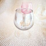 Small glasses with multicolored feet