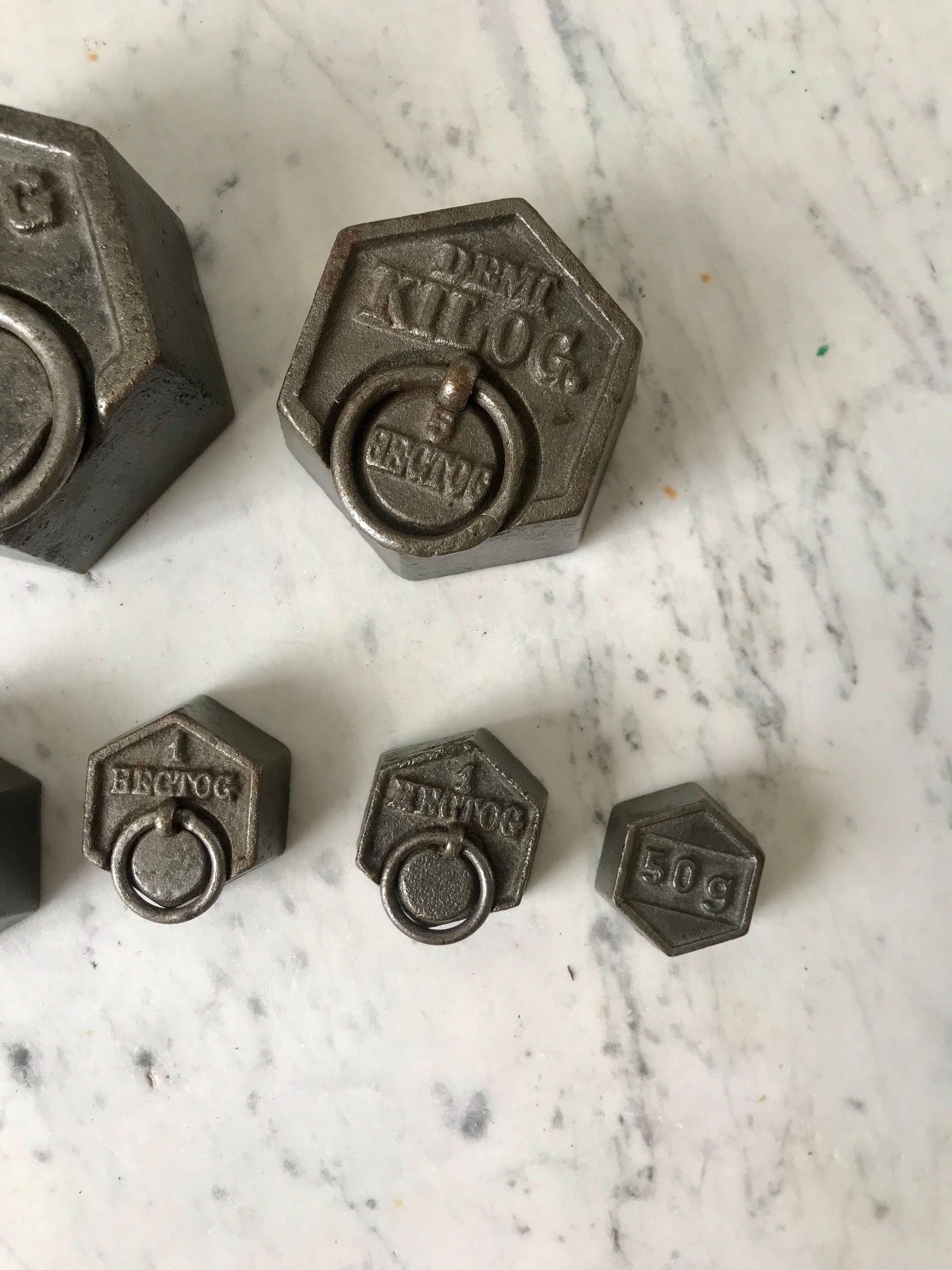 set of old measuring weights early twentieth century