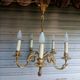 Antique gilded bronze chandelier in Louis XVI style, 5 lights, in working condition.