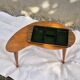 Vintage Scandinavian bean side table with wooden tapered legs.