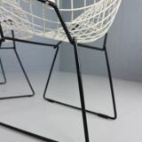 Set of two Diamond chair by Harry Bertoia in white & black metal. 1960s