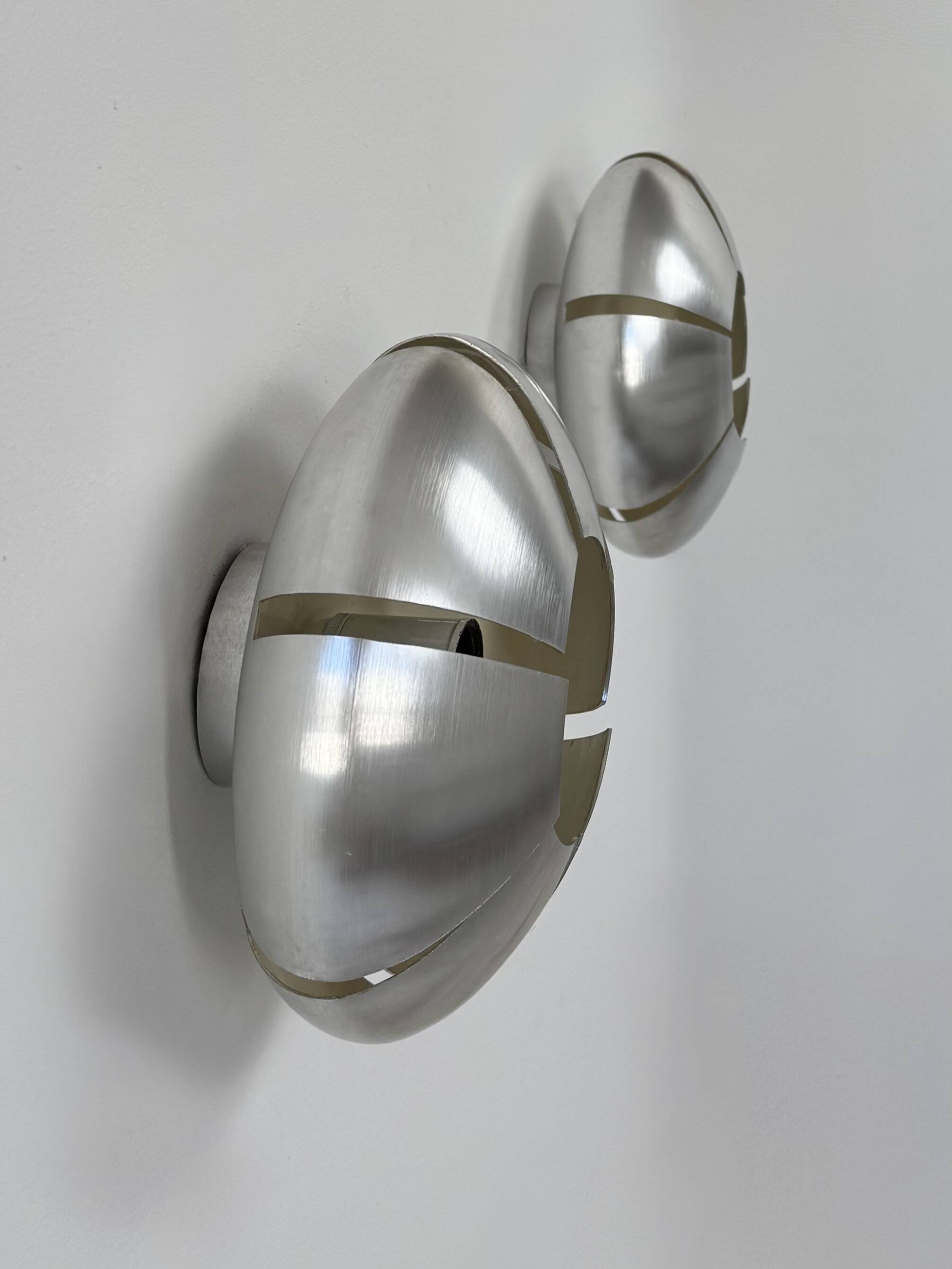 Pair of vintage wall lights, brushed aluminium, France, 1970.