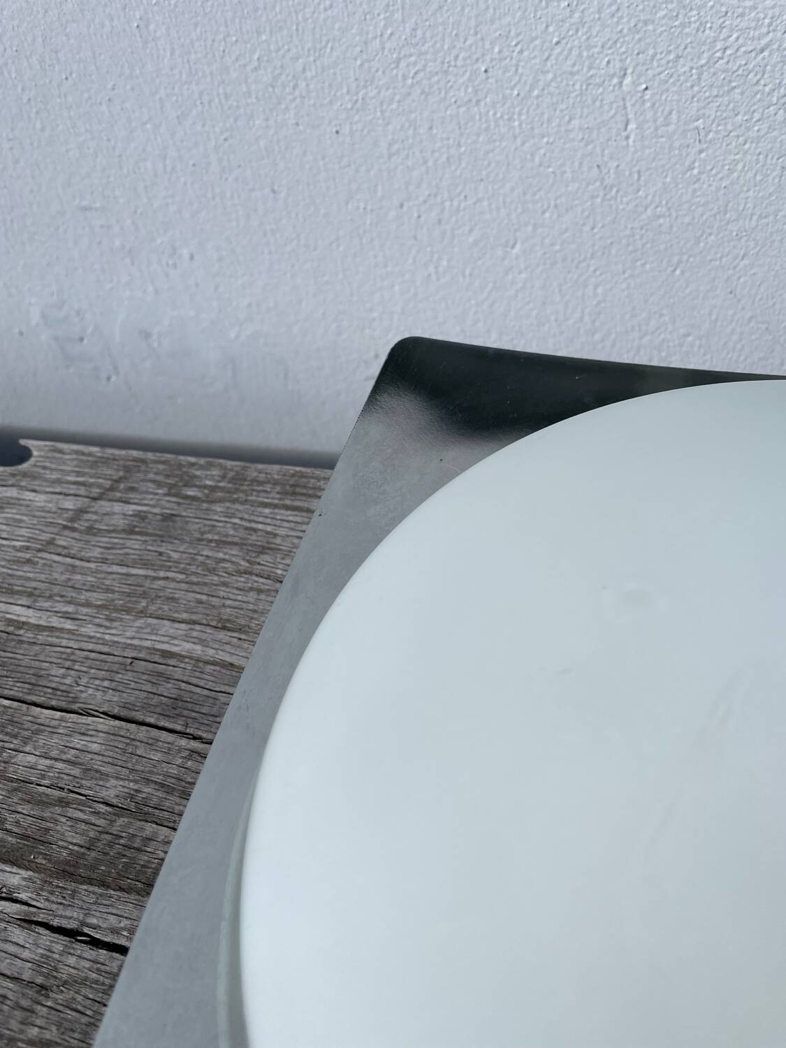 White glass and stainless steel ceiling light