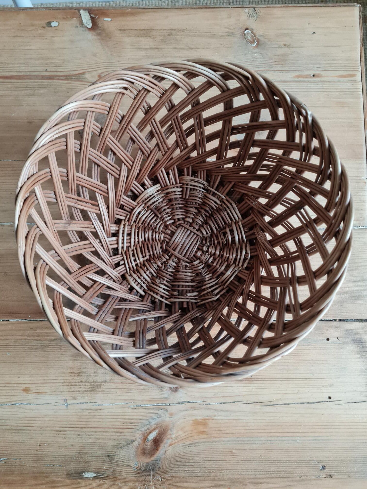 Braided wicker fruit basket