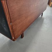Vintage enfilade in teak and leather, 1970s.