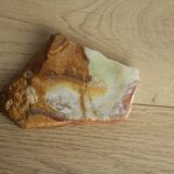 Empty pocket in orange and white marble ashtray