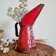Red metal canister pot
