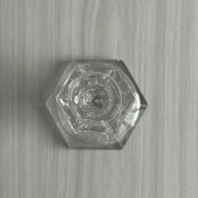 bougeoir en verre taillé transparent
