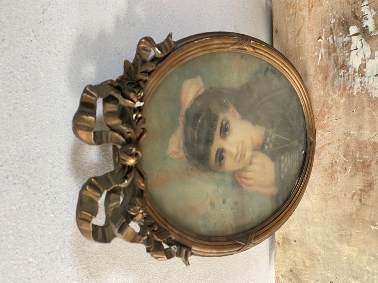 Portrait of a young girl in pastel and beautiful oval frame