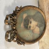 Portrait of a young girl in pastel and beautiful oval frame