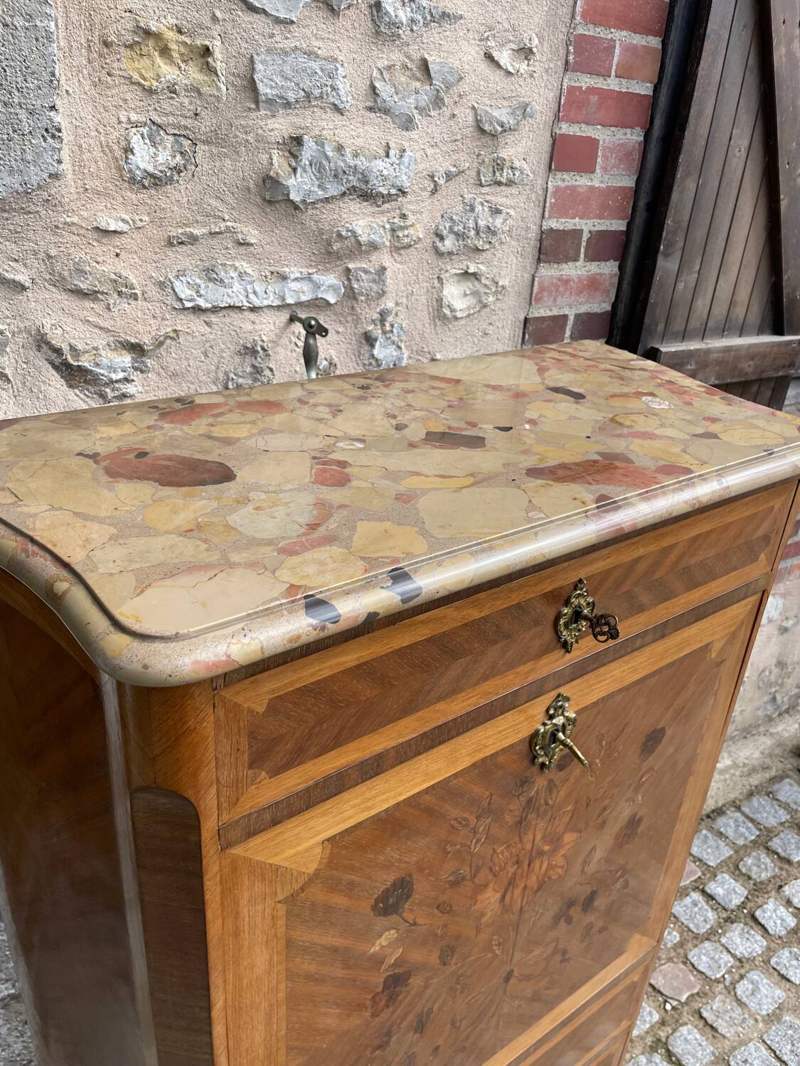 Old wooden and marble secretary