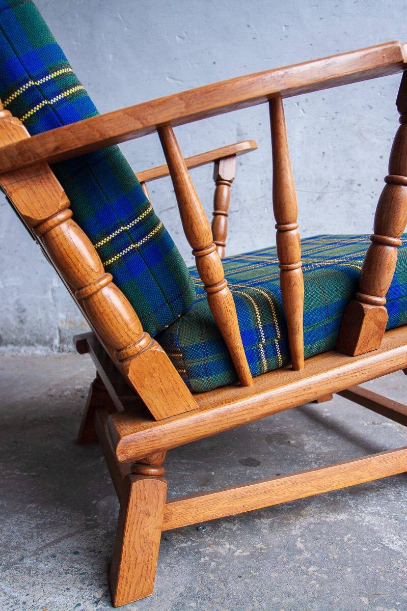 Set of 2 oak armchairs in mid-century style, covered in a blue-green checked fabric.