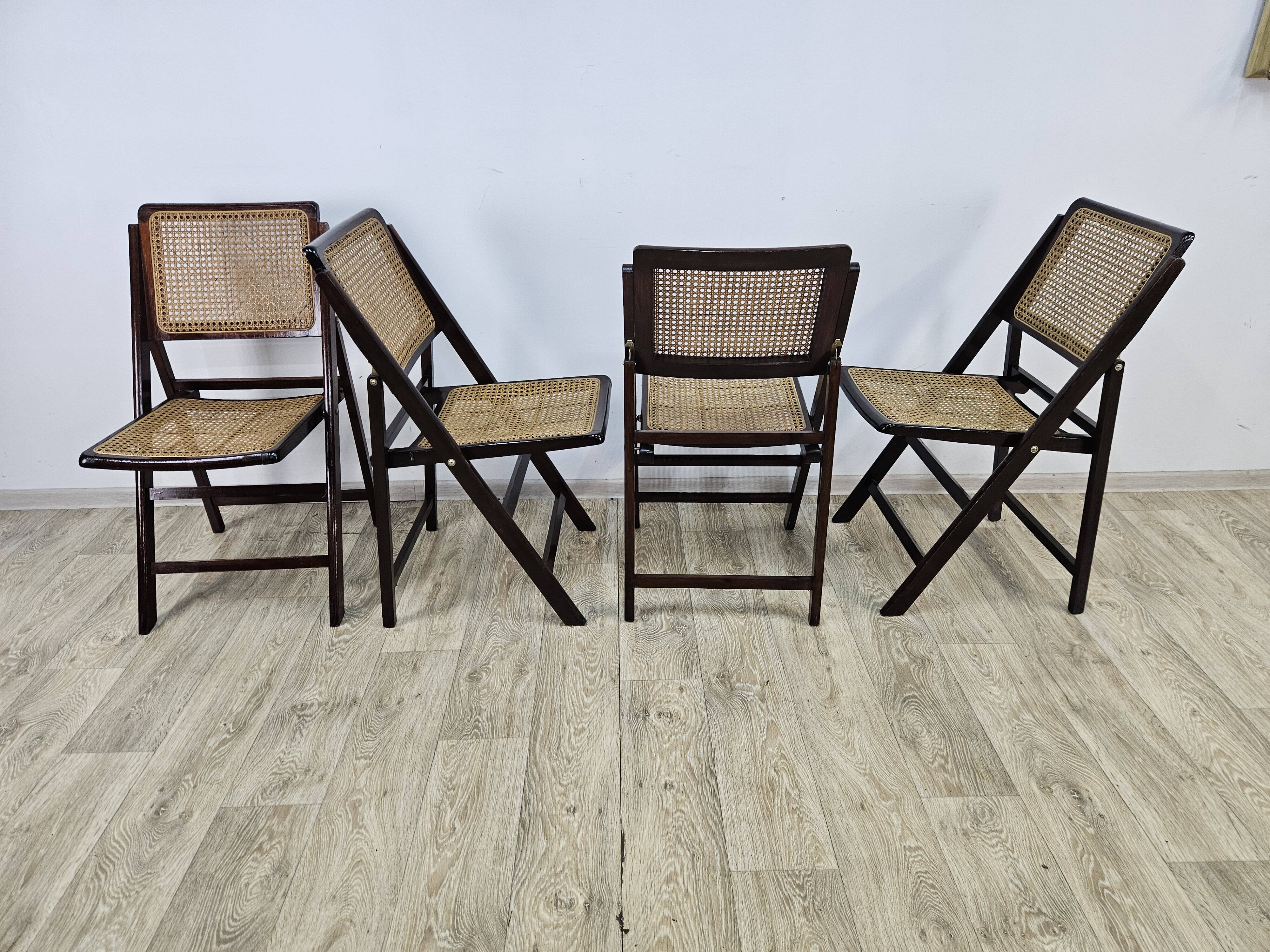 Folding wooden chairs with raffia, 1970s.