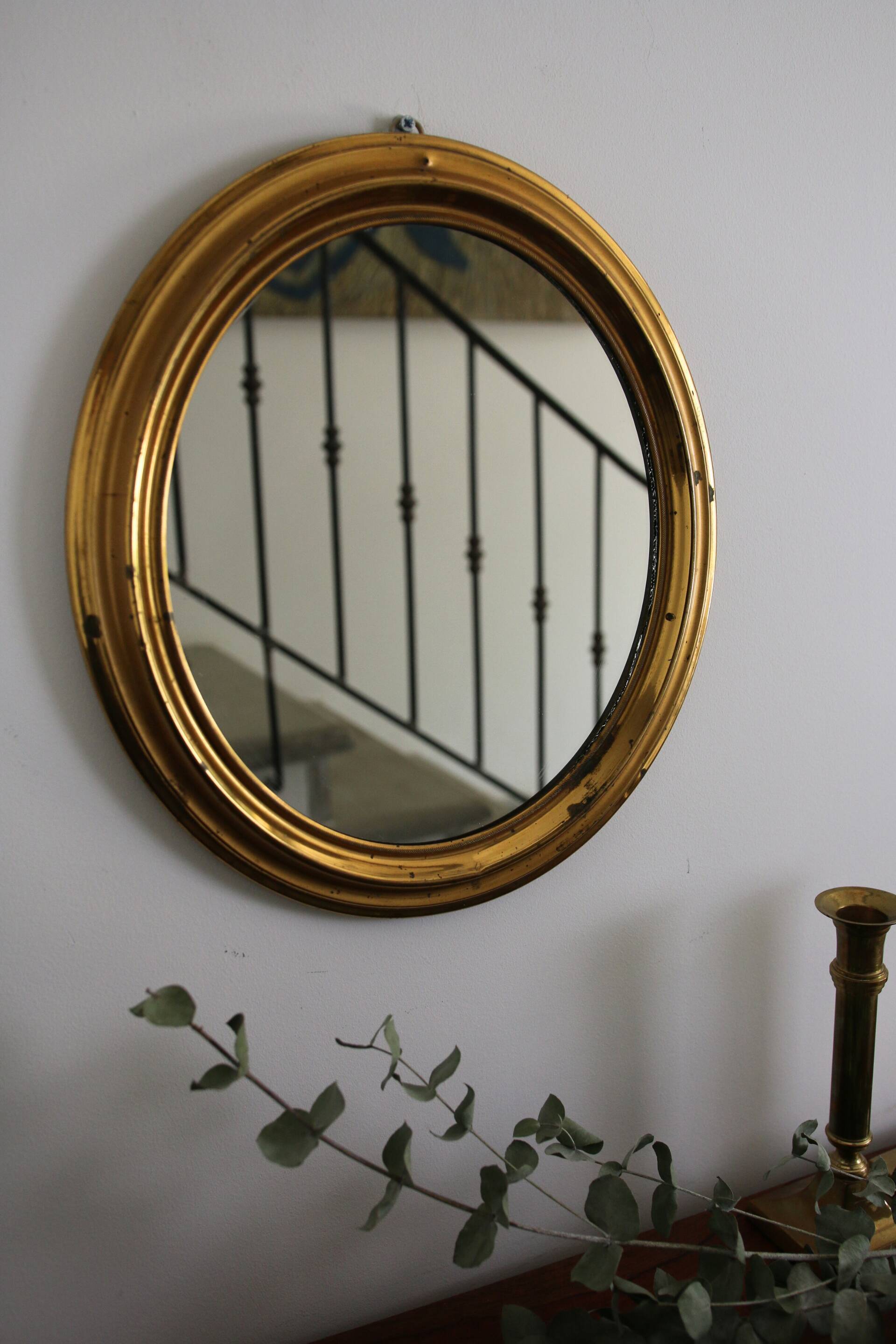Oval brass mirror
