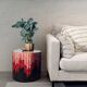 Side table with straw/inlaid concrete.