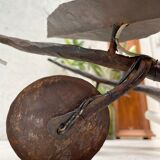 Wall lamp in wrought iron.